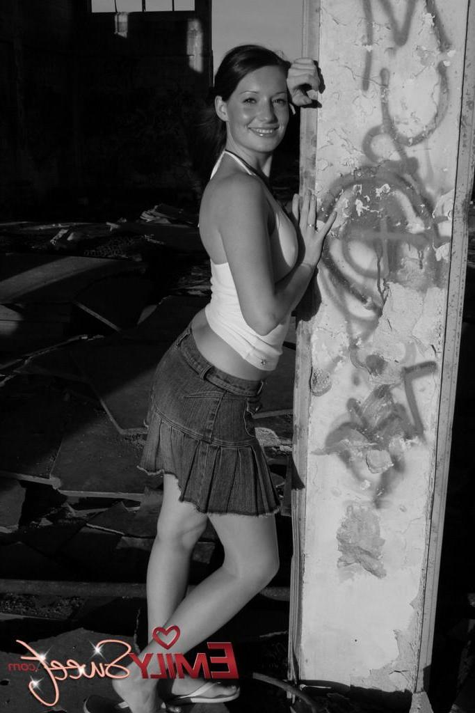 20P Pictures of teen model Emily Sweet flashing in black and white