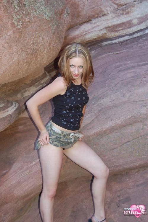 16P Beautiful girl Laura goes rock climbing and gets naked in stilettos