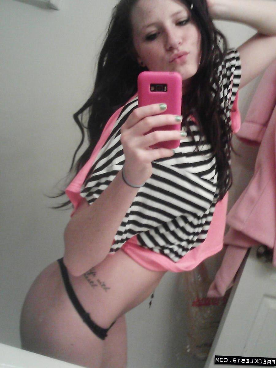 12P Pictures of Freckles 18 taking pics of herself in a black thong