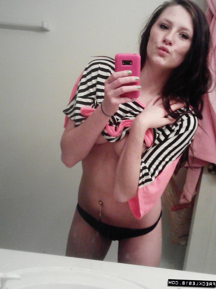 12P Pictures of Freckles 18 taking pics of herself in a black thong