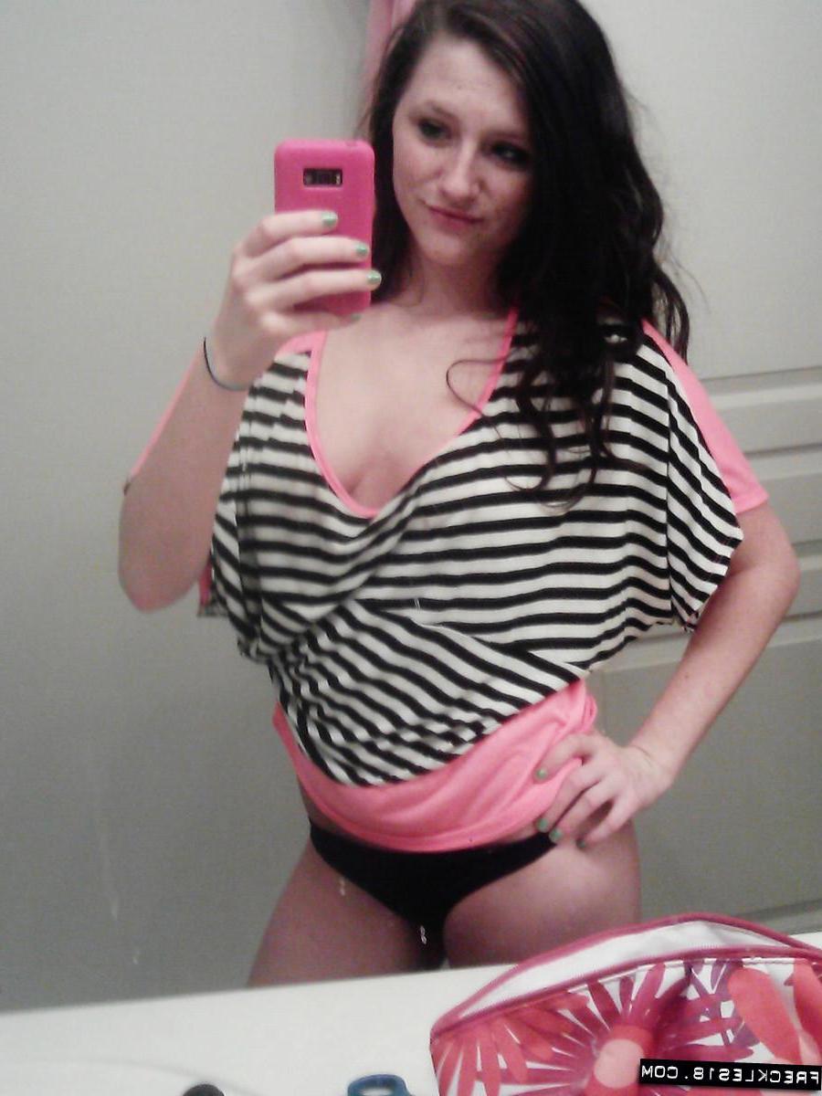 12P Pictures of Freckles 18 taking pics of herself in a black thong