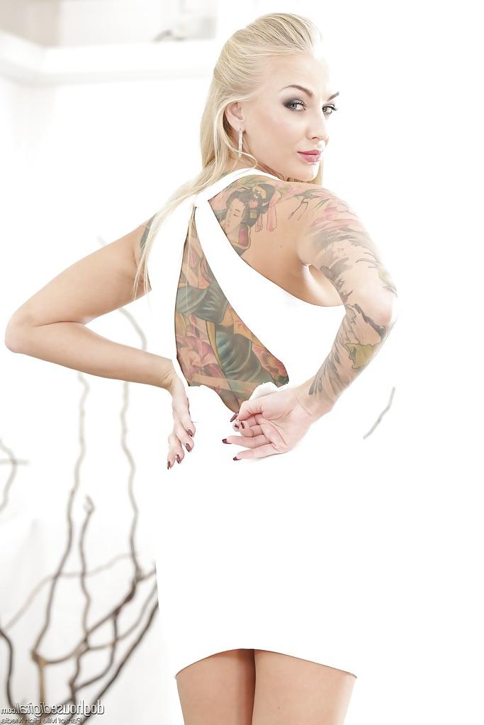 16P Inked blonde babe Kayla Green posing clothed before stripping naked