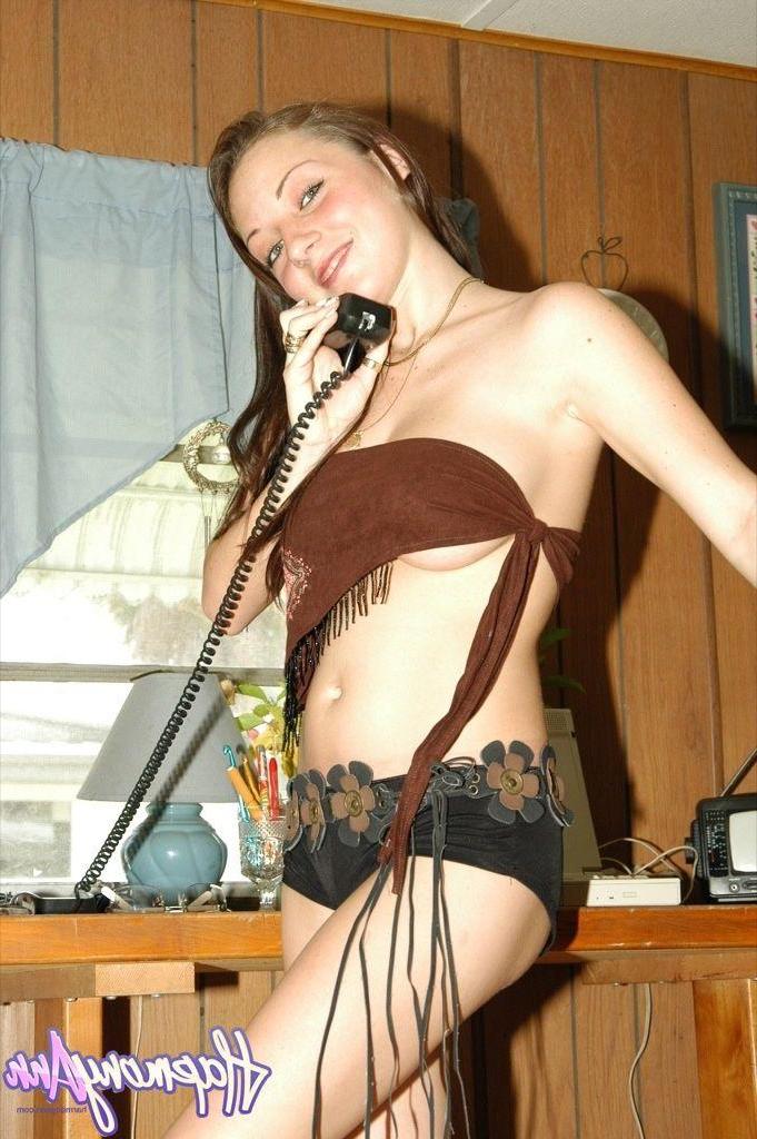 20P Pictures of teen amateur Harmony Ann teasing in her office