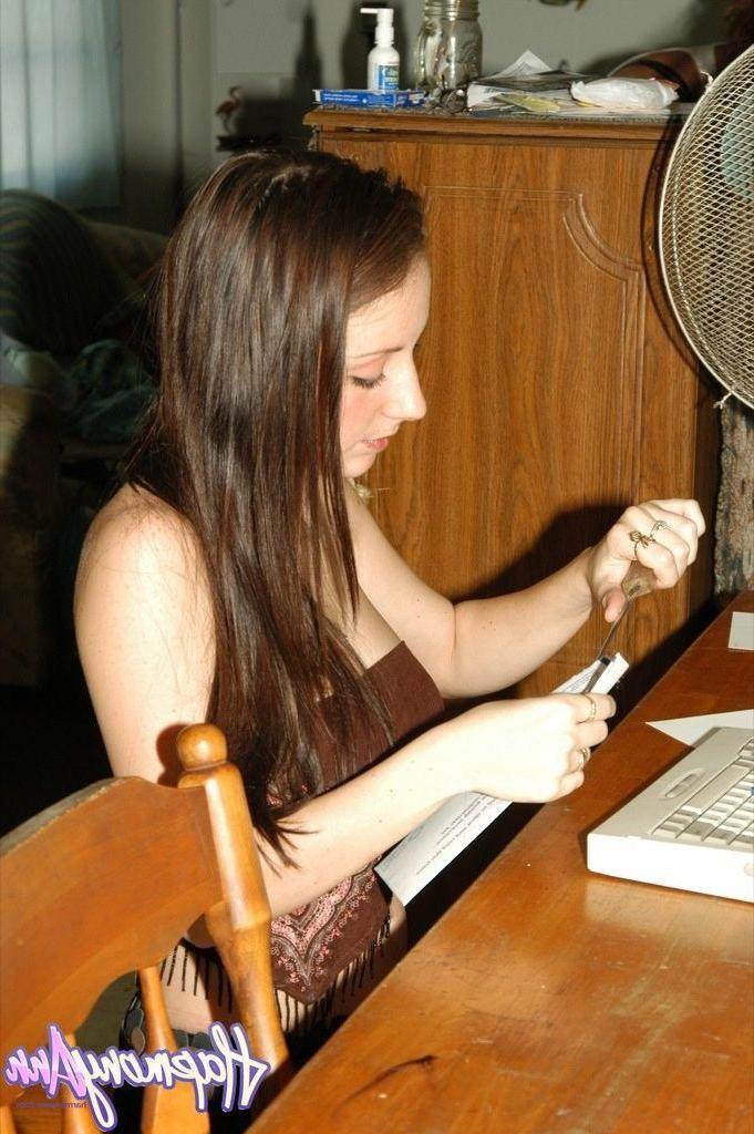 20P Pictures of teen amateur Harmony Ann teasing in her office