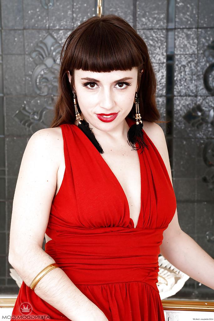 16P Hairy female in red outfit Simone Delilah pinches her nipples and rubs clit