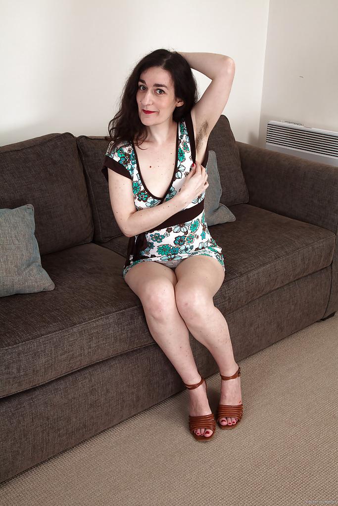 16P Hairy mature lassie stripping down and showcasing her bushy twat