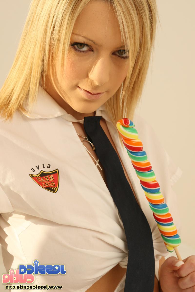 20P Pictures of Jessica Cutie trying to fit a massive black dildo into her tiny teen