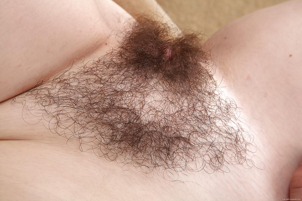 16P Hairy mature redhead Sara spreading her wet pussy and showing off