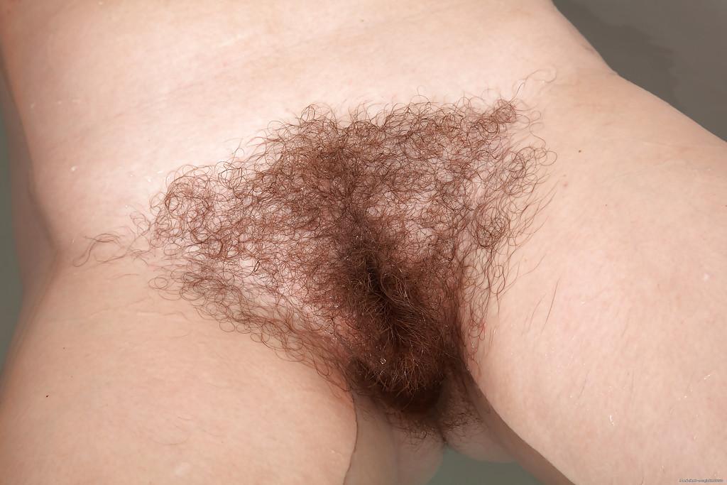 16P Lusty MILF getting nude and showcasing her shhaggy twat in close up