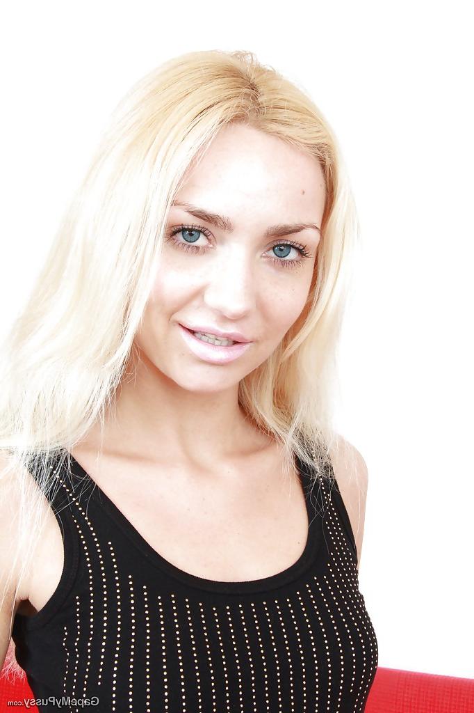 16P Fair-haired babe is spreading her beautiful pussy lips in close up