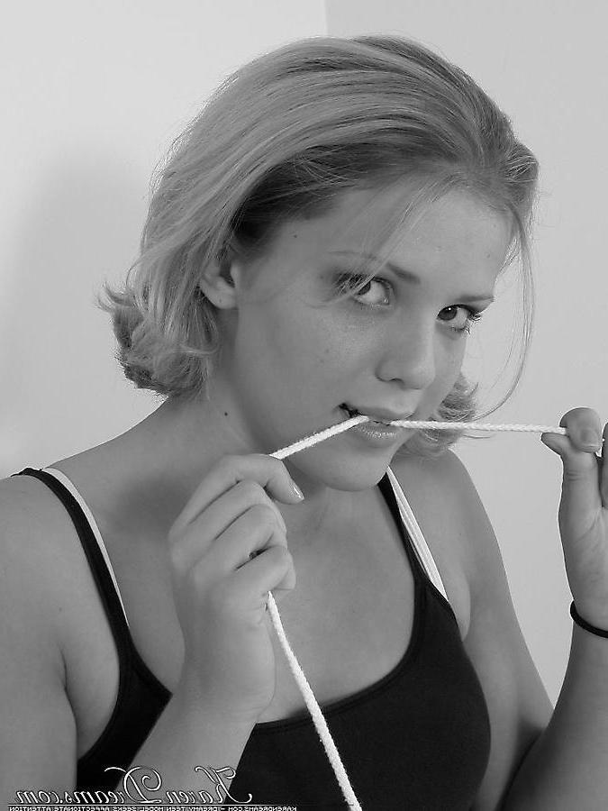 19P Pictures of teen babe Karen Dreams teasing in black and white
