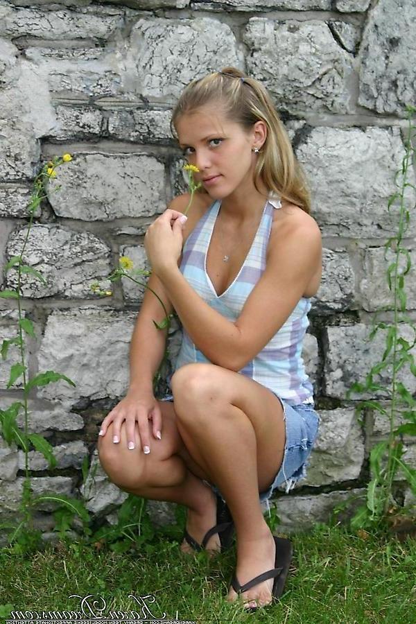 20P Pictures of teen Karen Dreams showing you up her skirt outside