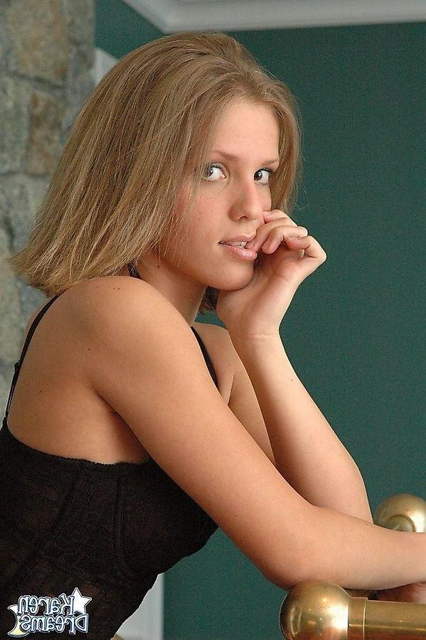 20P Pictures of teen model Karen Dreams dressed in hot black stockings