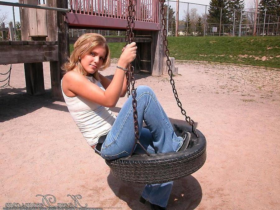 20P Pictures of teen babe Karen Dreams teasing at a park