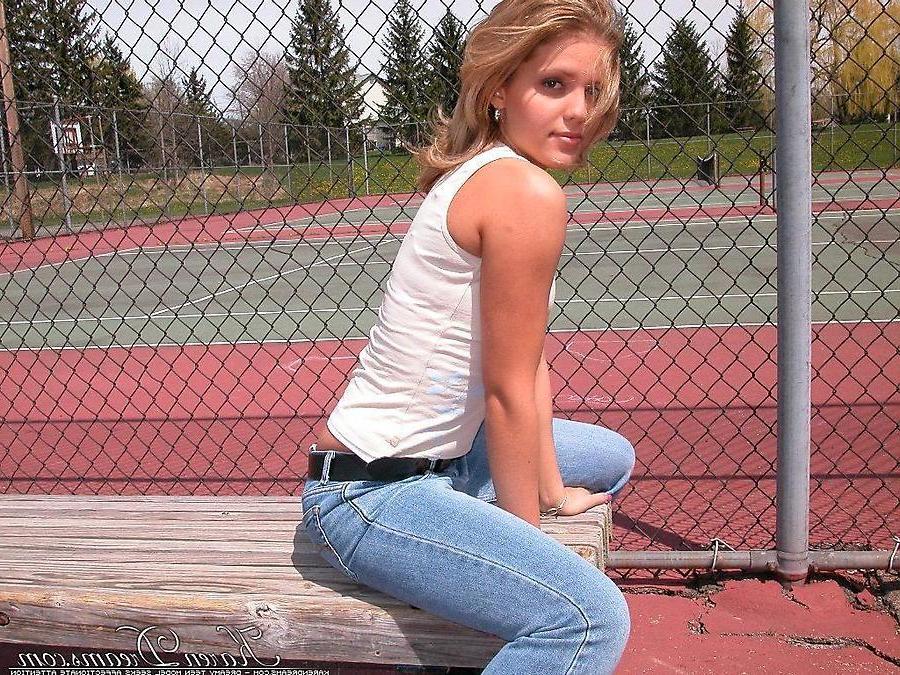 20P Pictures of teen babe Karen Dreams teasing at a park