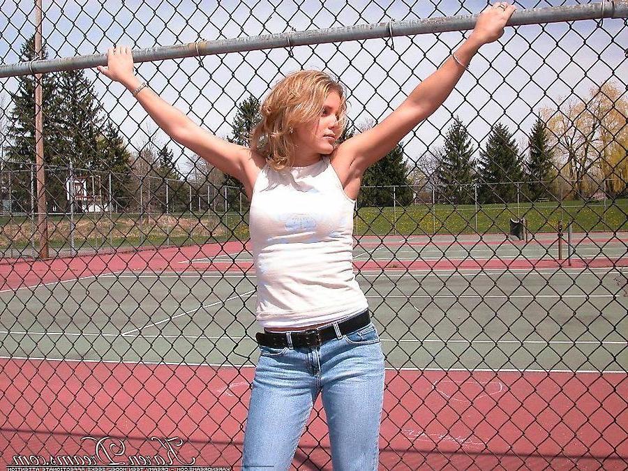 20P Pictures of teen babe Karen Dreams teasing at a park