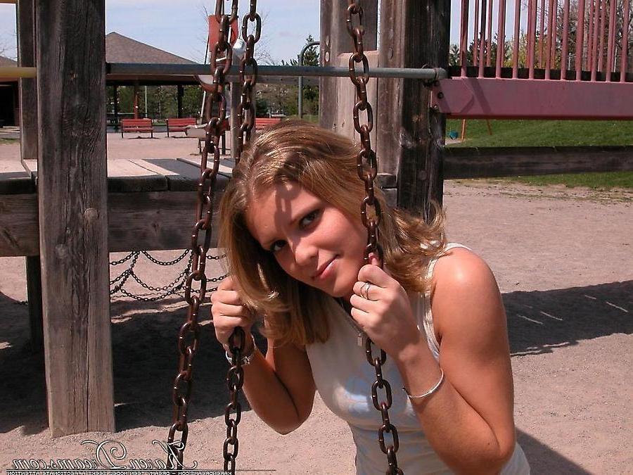20P Pictures of teen babe Karen Dreams teasing at a park