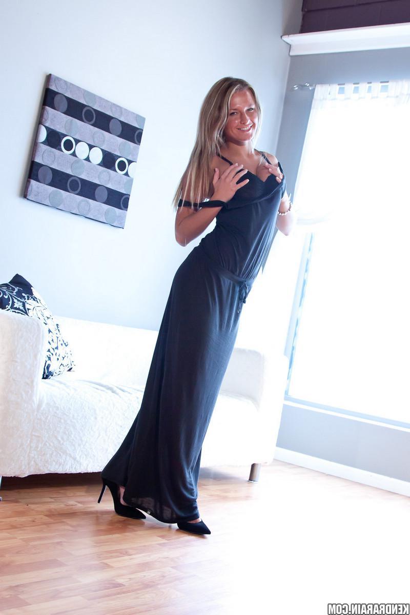 16P Blonde girl Kendra Rain strips out of her long black dress and gets ready for you