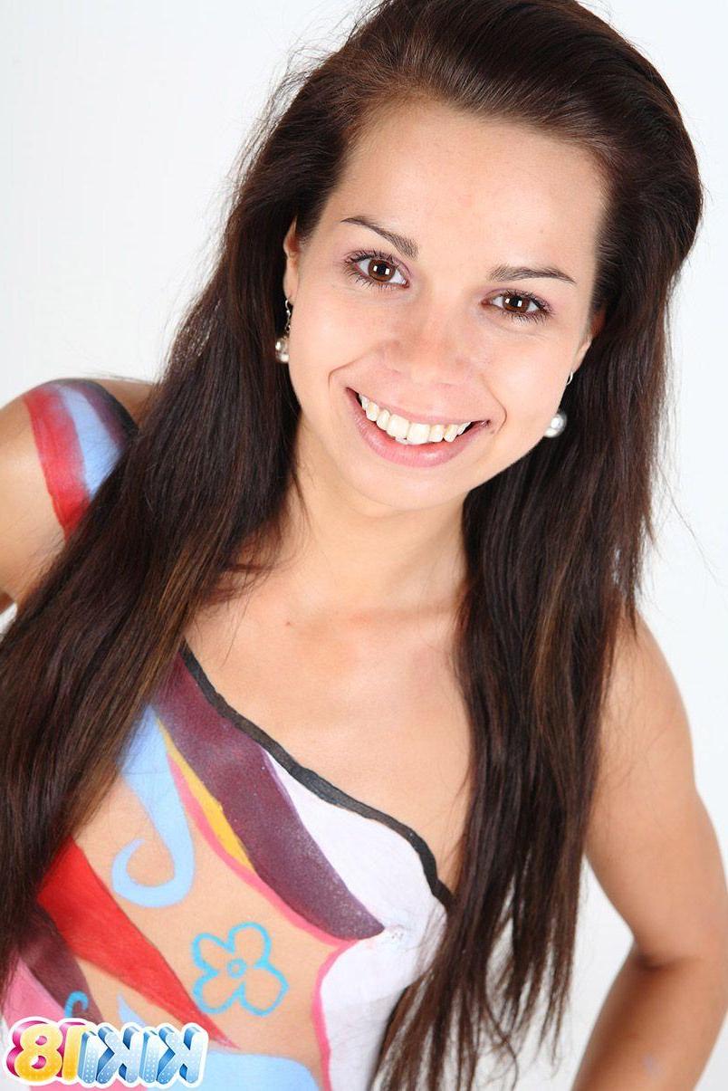 15P Pictures of teen hottie Kiki 18 getting painted with latex paint