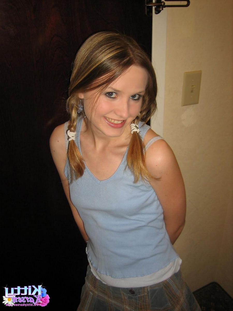 16P Pictures of Kitty Karsen getting completely nude for you