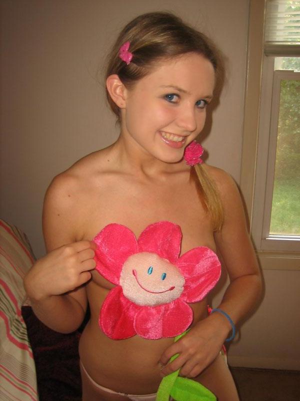 16P Pictures of teen hottie Kitty Karsen naked and rubbing her pussy