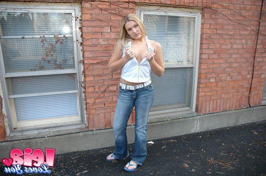 12P Pictures of teen hottie Leia Loves You showing off her ass outside