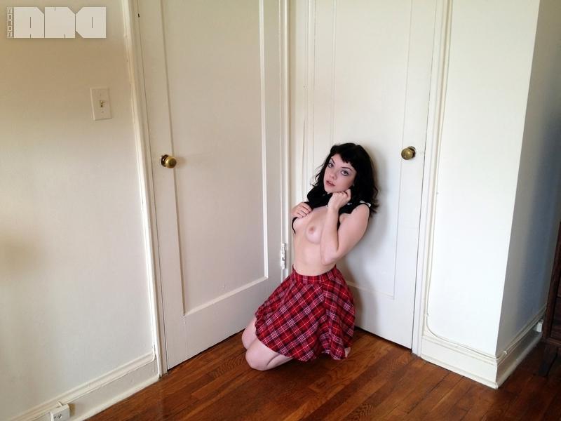 15P Pretty pinup girl Lilly Rose strips out of her plaid skirt at home