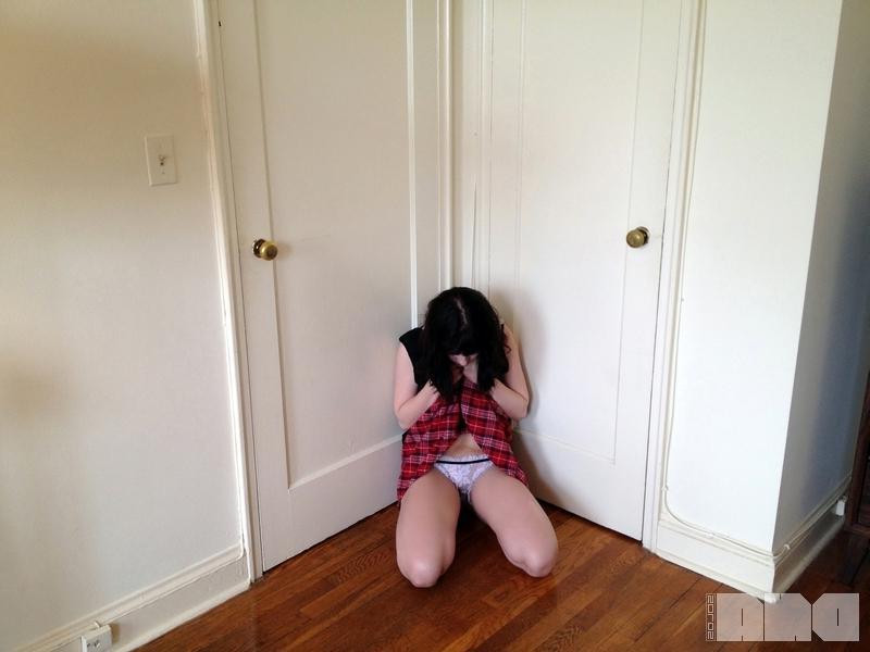 15P Pretty pinup girl Lilly Rose strips out of her plaid skirt at home