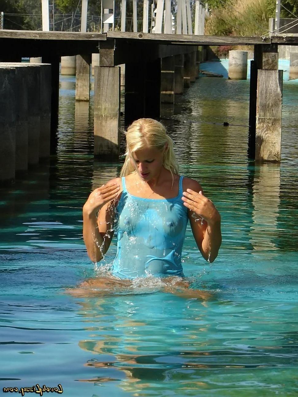 20P Pictures of Lovely Lizzy going for a swim in her clothes