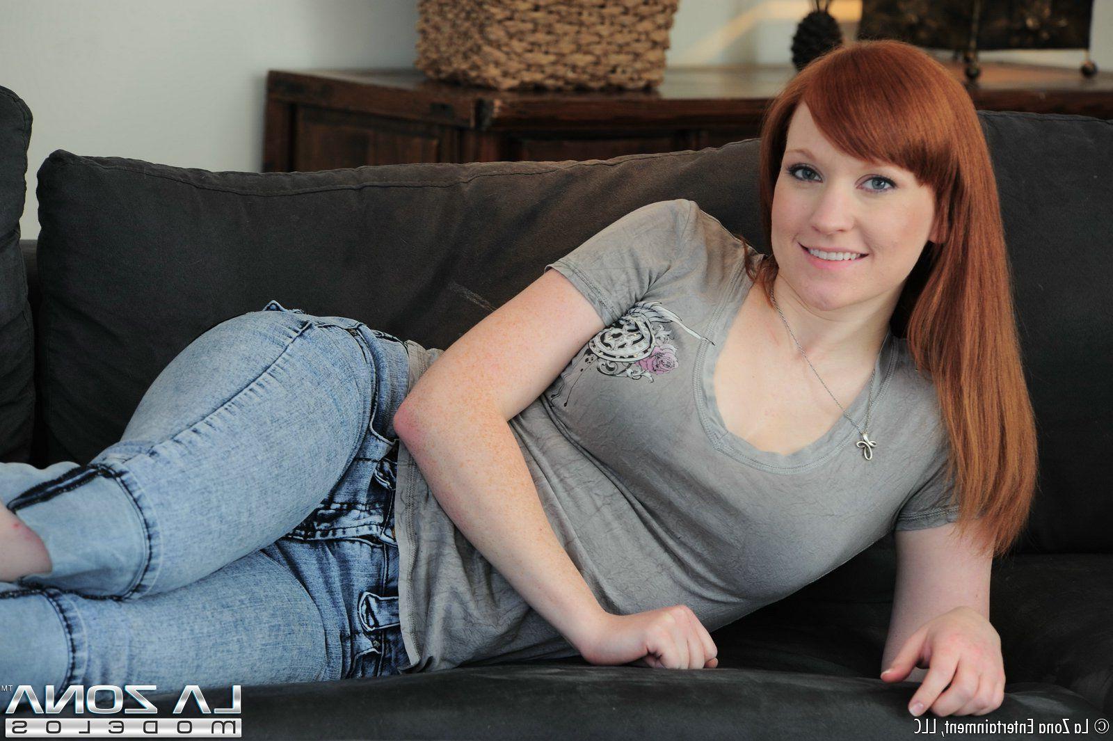 15P Pictures of redhead teen Lucy pleasuring her clit with a vibrator