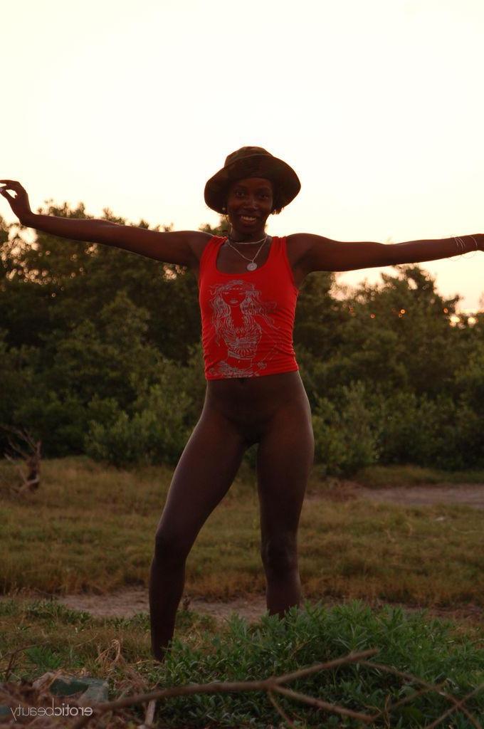 16P Black girl Maria L strips naked outside