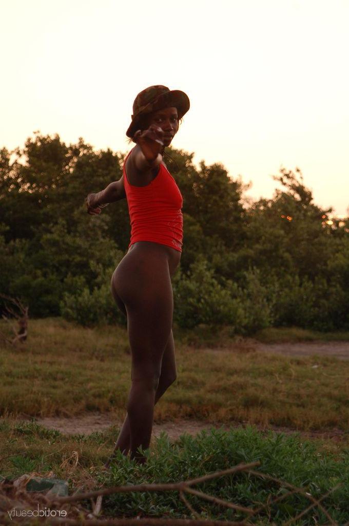 16P Black girl Maria L strips naked outside