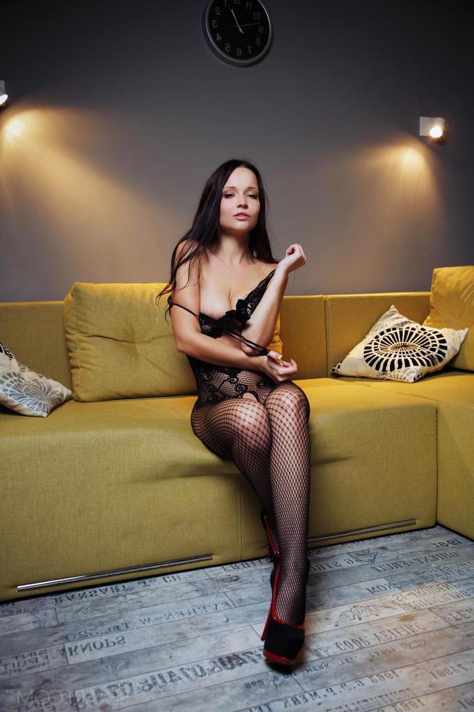 12P Gorgeous model Marica A spreads her legs in black fishnets