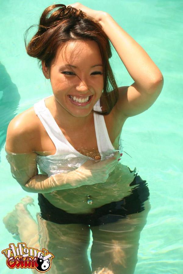 20P Pictures of Naughty Miko showing you her tits