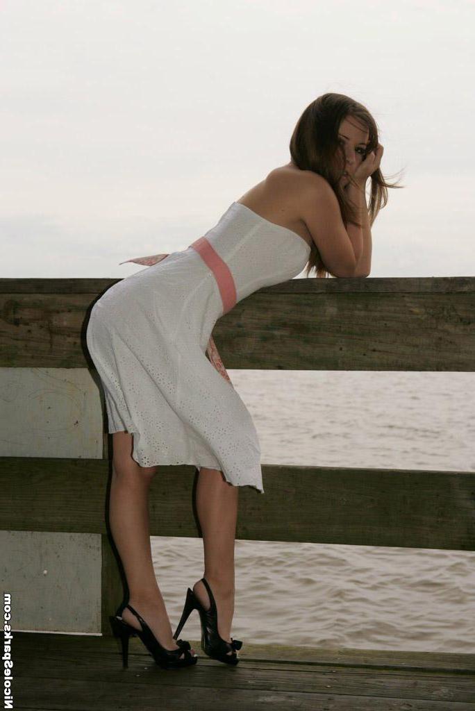 15P Pictures of teen Nicole Sparks relaxing by the water