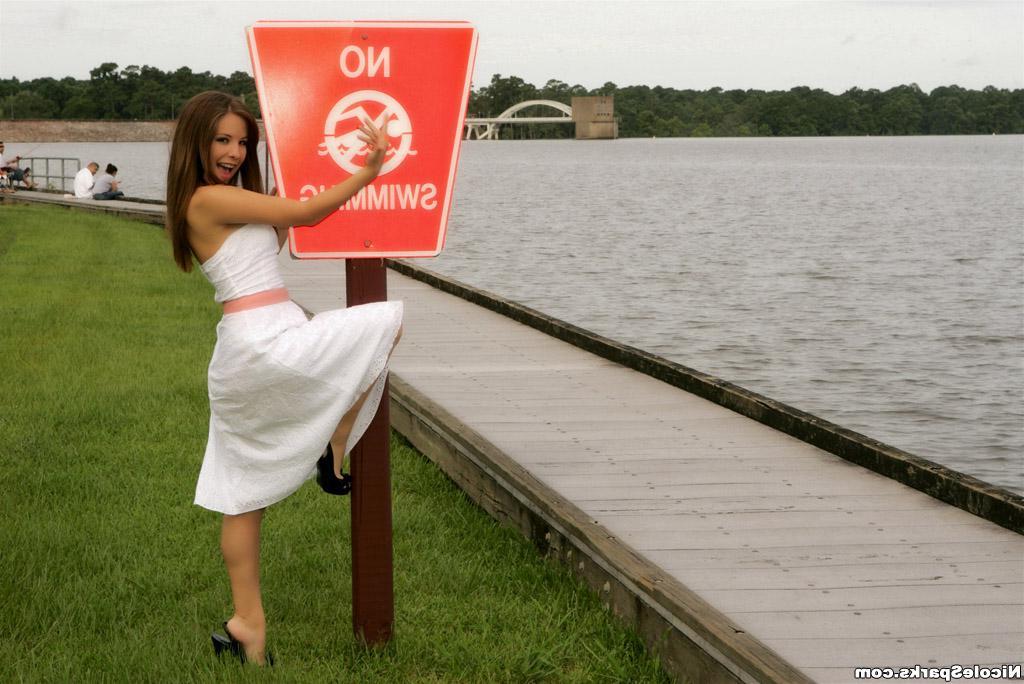15P Pictures of teen Nicole Sparks relaxing by the water