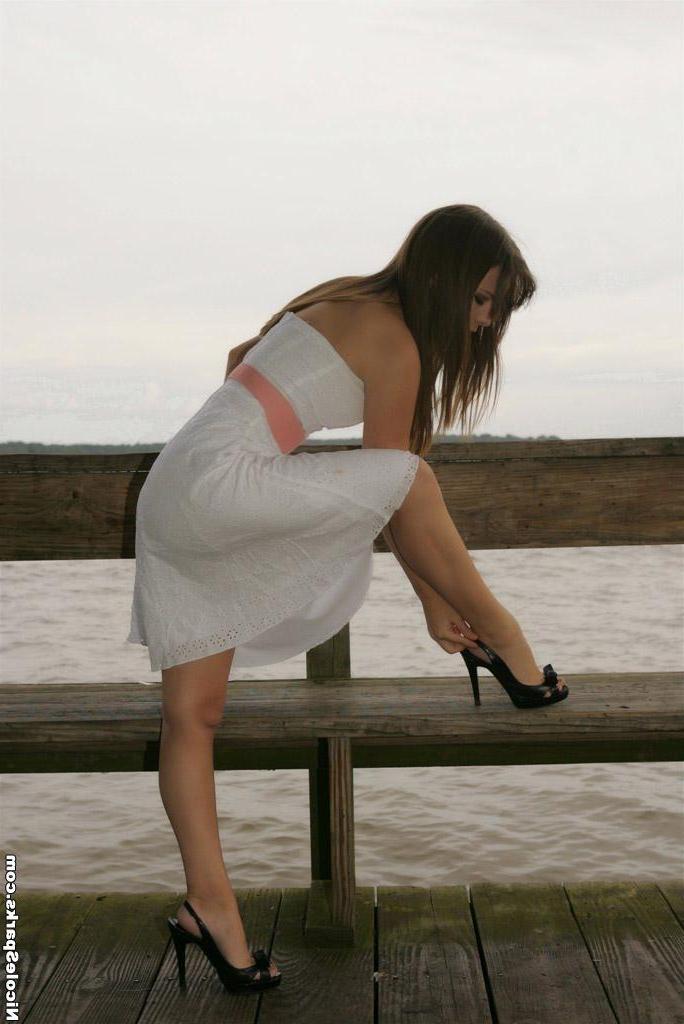 15P Pictures of teen Nicole Sparks relaxing by the water