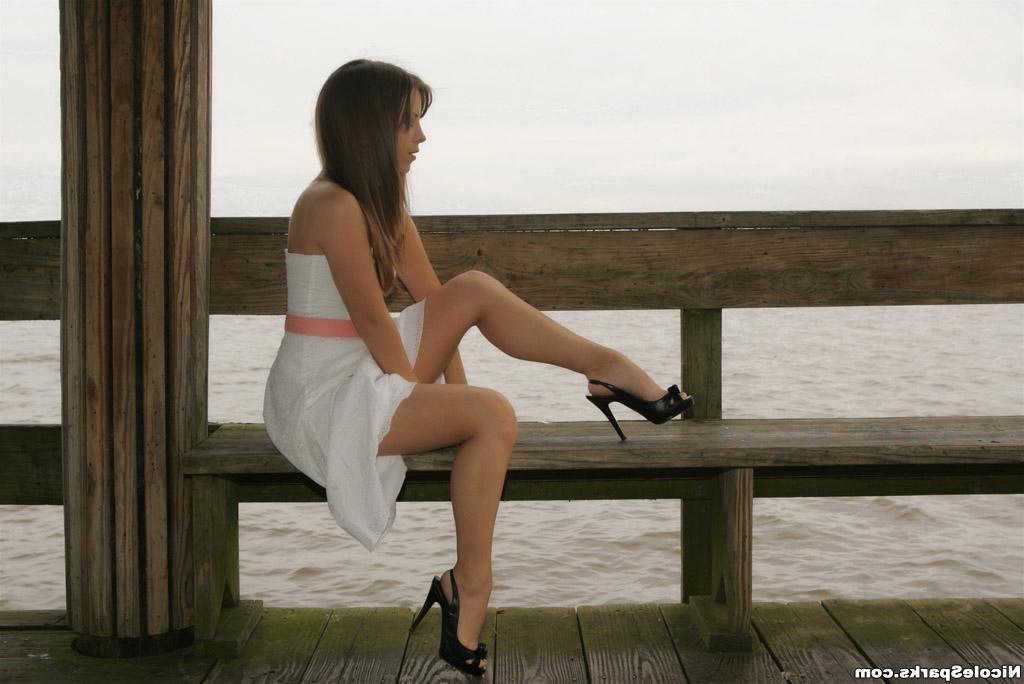 15P Pictures of teen Nicole Sparks relaxing by the water