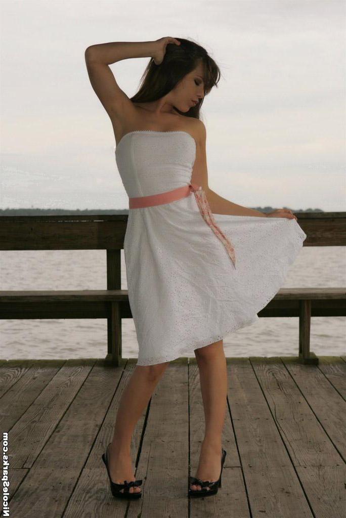 15P Pictures of teen Nicole Sparks relaxing by the water