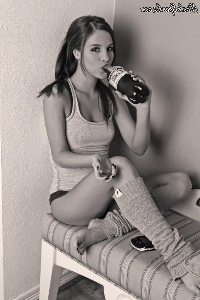 15P Pictures of teen cutie Nicole Sparks sucking on a bottle in black and white