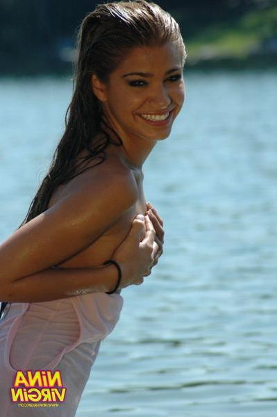 20P Pictures of teen Nina Virgin getting all wet