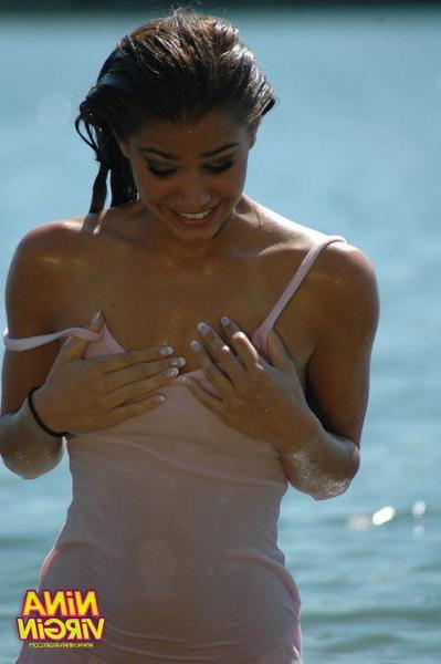 20P Pictures of teen Nina Virgin getting all wet