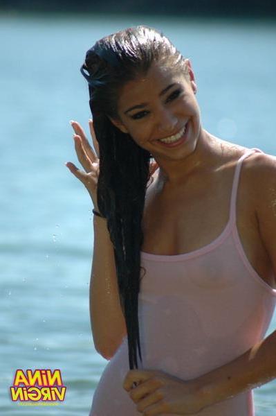 20P Pictures of teen Nina Virgin getting all wet