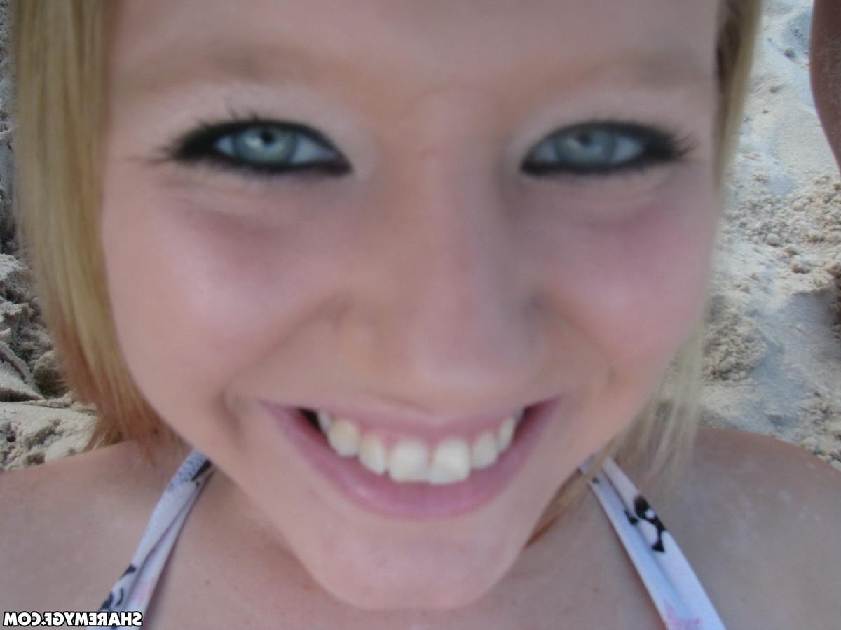 20P Two hot teen girlfriends have some fun on the beach