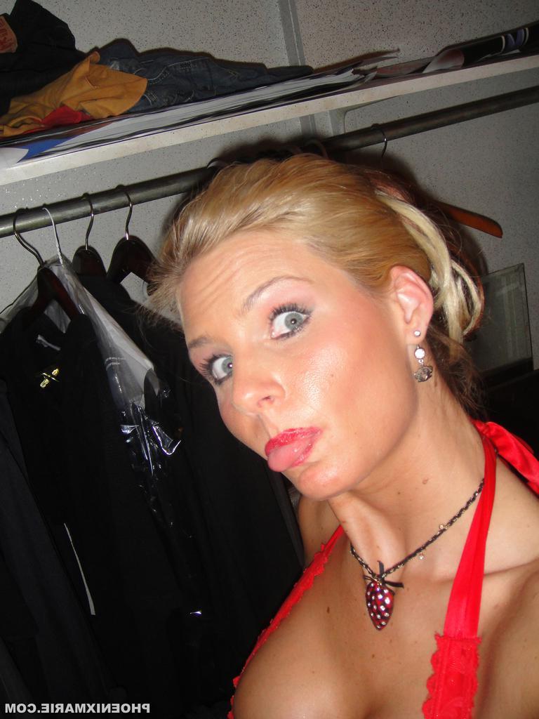 15P Phoenix Marie getting naughty at the VIP access trade show
