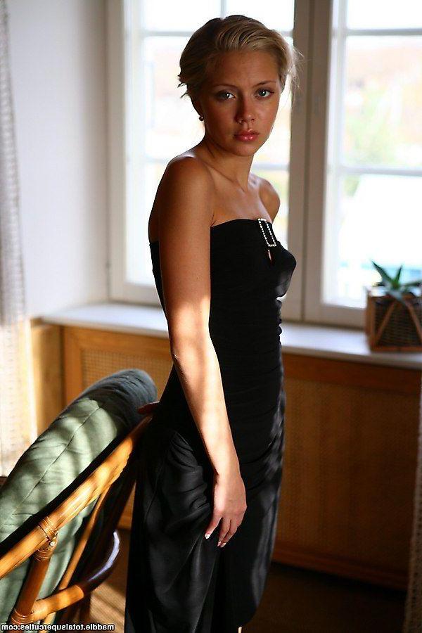 20P Pictures of teen Maddie showing off in a black dress