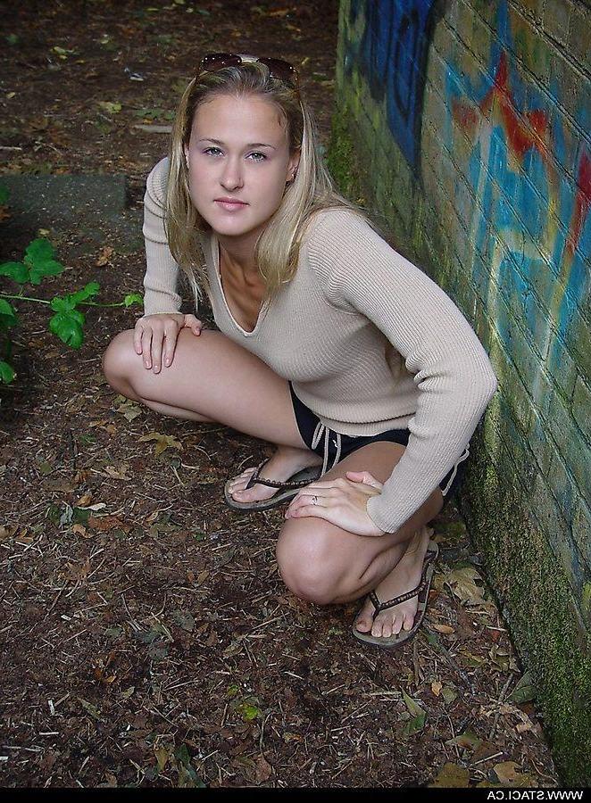 20P Pictures of teen chick Staci.ca getting nude outside