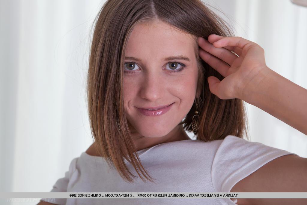 18P Beautiful teen Talinka A gives you a super close up of her tight pussy