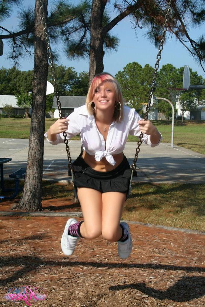 20P Pictures of schoolgirl Tara Ryan swinging in the park