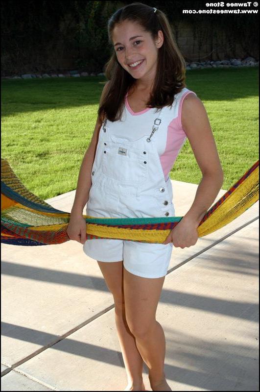 20P Pictures of Tawnee Stone relaxing in the back yard